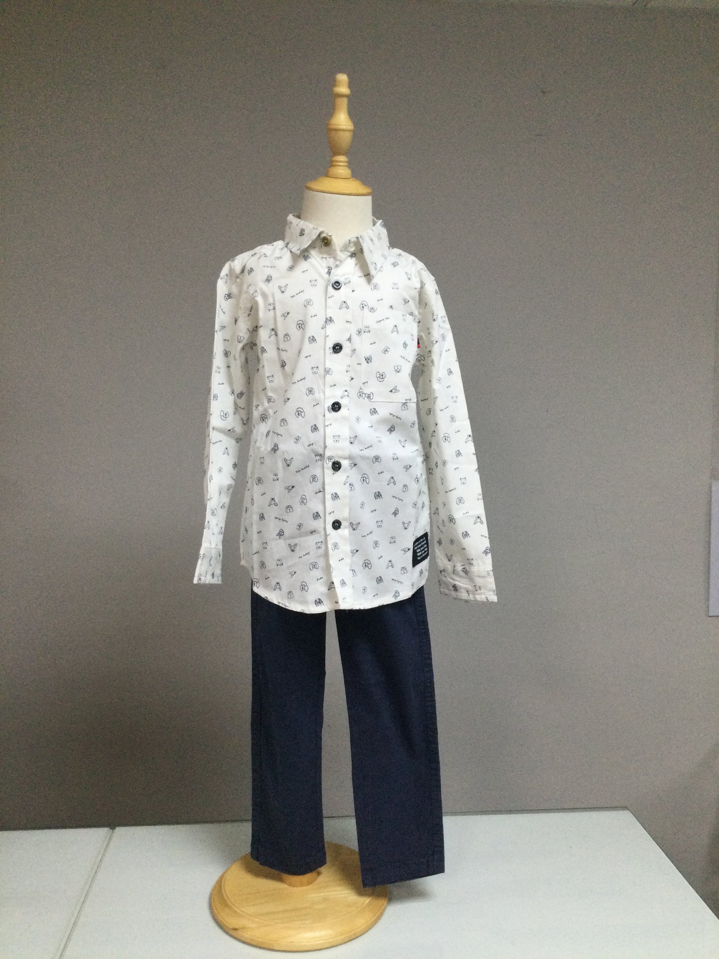TucTuc NK Conjunto Camisa Blanca con Estampado de Iconos para Niño Colección Pet Friendly Town Ref. KB07B601W1