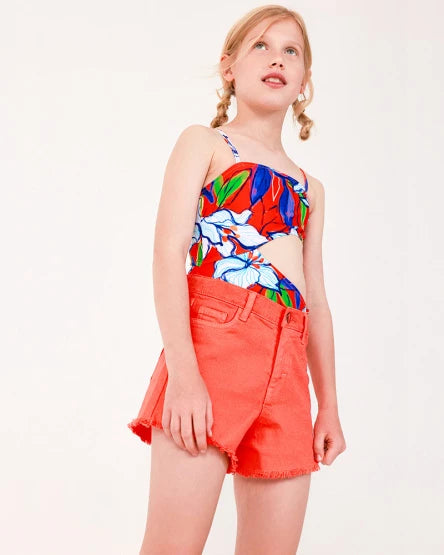 TucTuc NK Beyond The Beach Camiseta manga corta para niña en blanco y estampado floral Short para niña en denim coral y bolsillos laterales