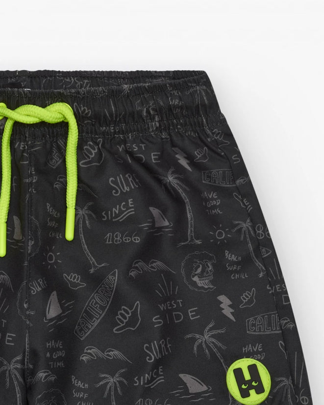 Tuc Tuc Conjunto Camiseta para niño en amarillo con estampado de pelicano Bañador para niño en negro con estampado surfero