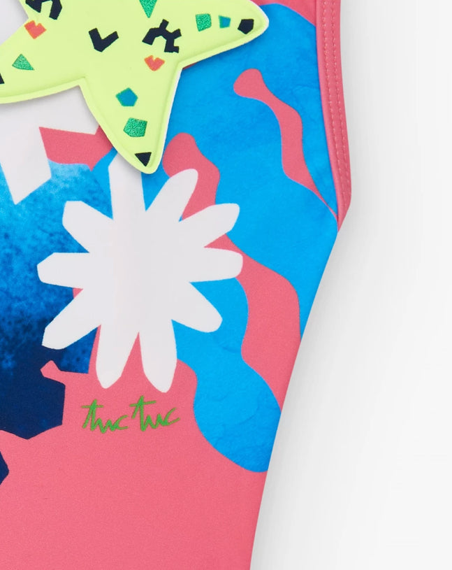 TucTuc Bañador Para Niña En Color Rosa Con Flores Y Tirantes Cruzados. Colección: Color The Sea