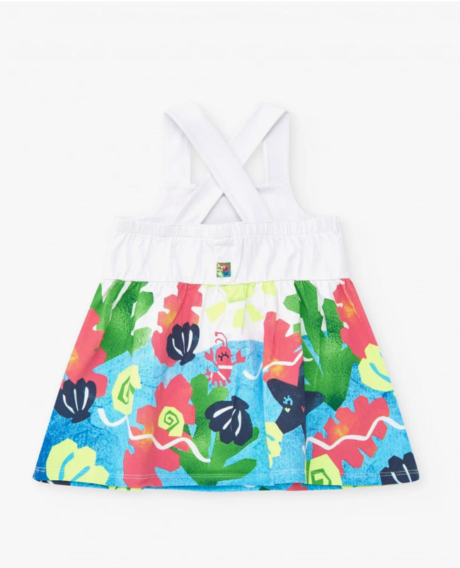 TucTuc Vestido Para Niña En Blanco Con Tirantes Cruzados Y Falda Floral. Colección: Color The Sea
