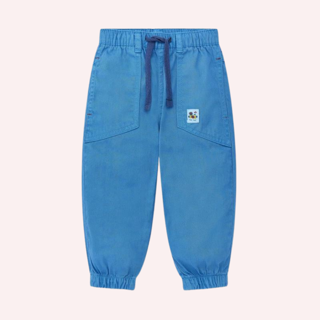 TucTuc Salty Air Printed White Knit T-Shirt and Blue Twill Pants
