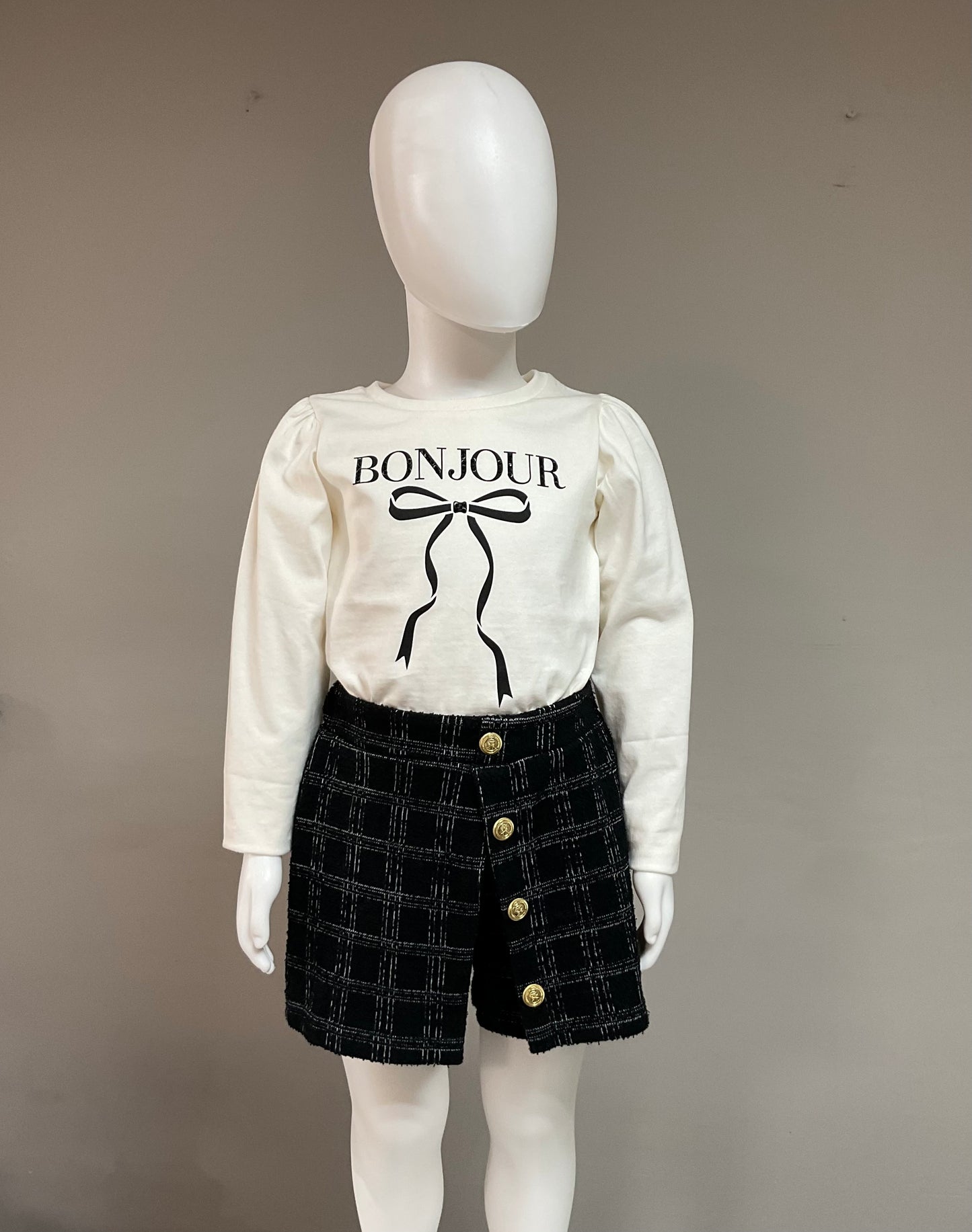 Tuc Tuc NK Conjunto Camiseta de manga larga color crema con lazo estampado y Falda Pantalón Negra