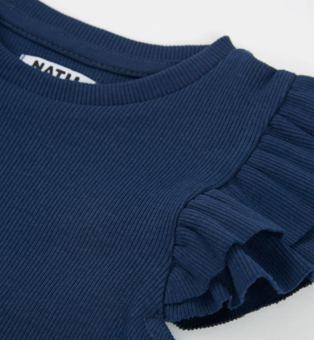 TucTuc NK Top Con Tejido Canelé Y Short Con Pliegues Frontales